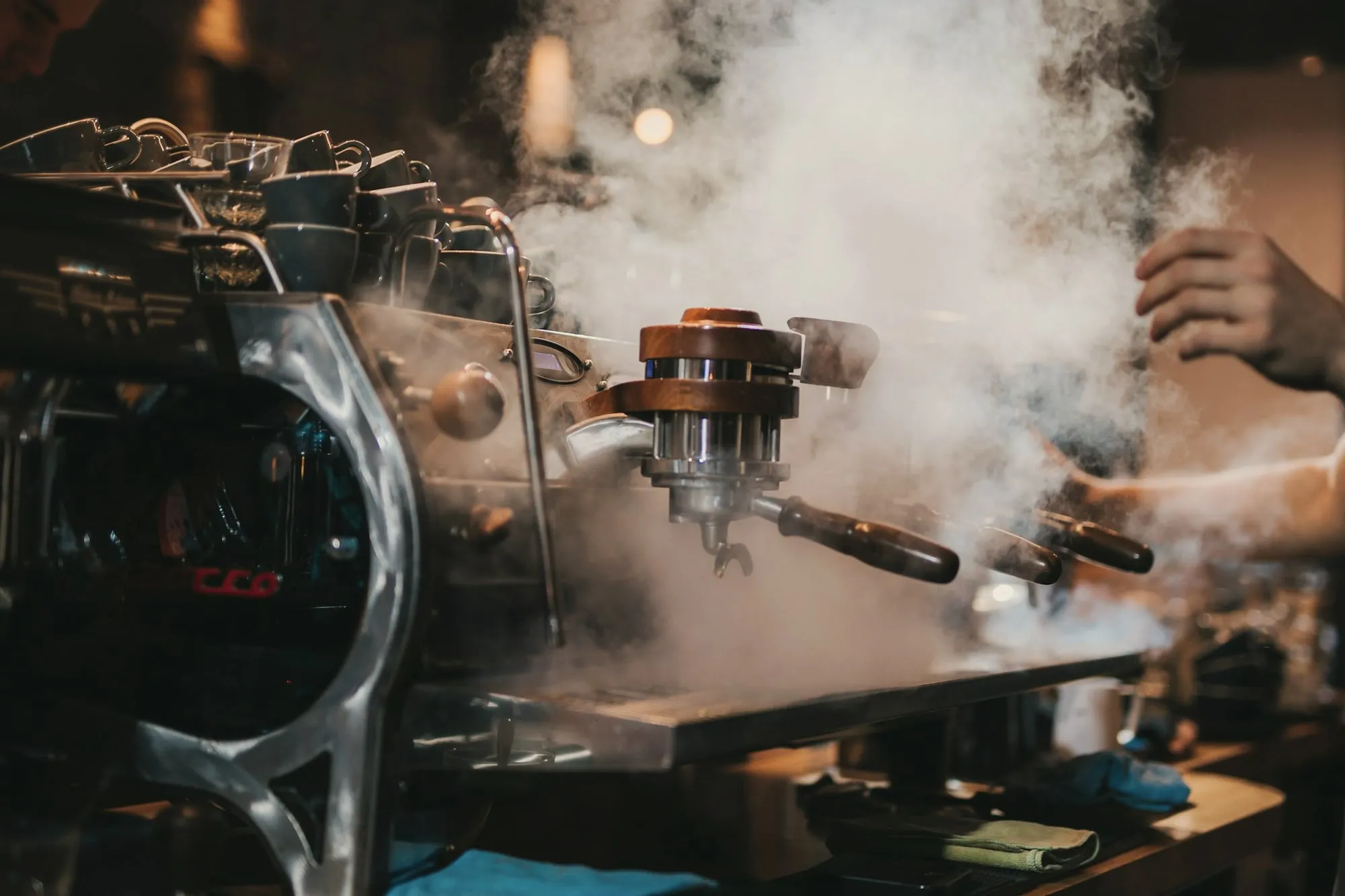 Steam rising from the espresso machine